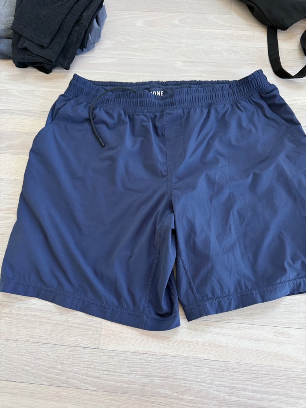 RHONE Navy Performance Shorts with Subtle Red Accent